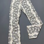 *AS-IS* RAD! ALLOVER DRAGON PRINT FLARED JEANS
