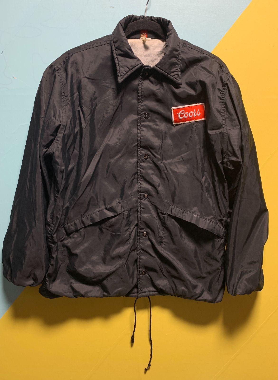 product details: RAD 1970S FULLY LINED COORS HAND-PATCHED COACHES SNAP BUTTON JACKET photo