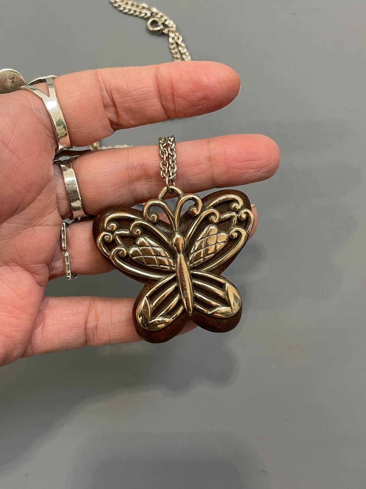 product details: ADORABLE WOOD MOUNTED SILVER BUTTERFLY NECKLACE photo