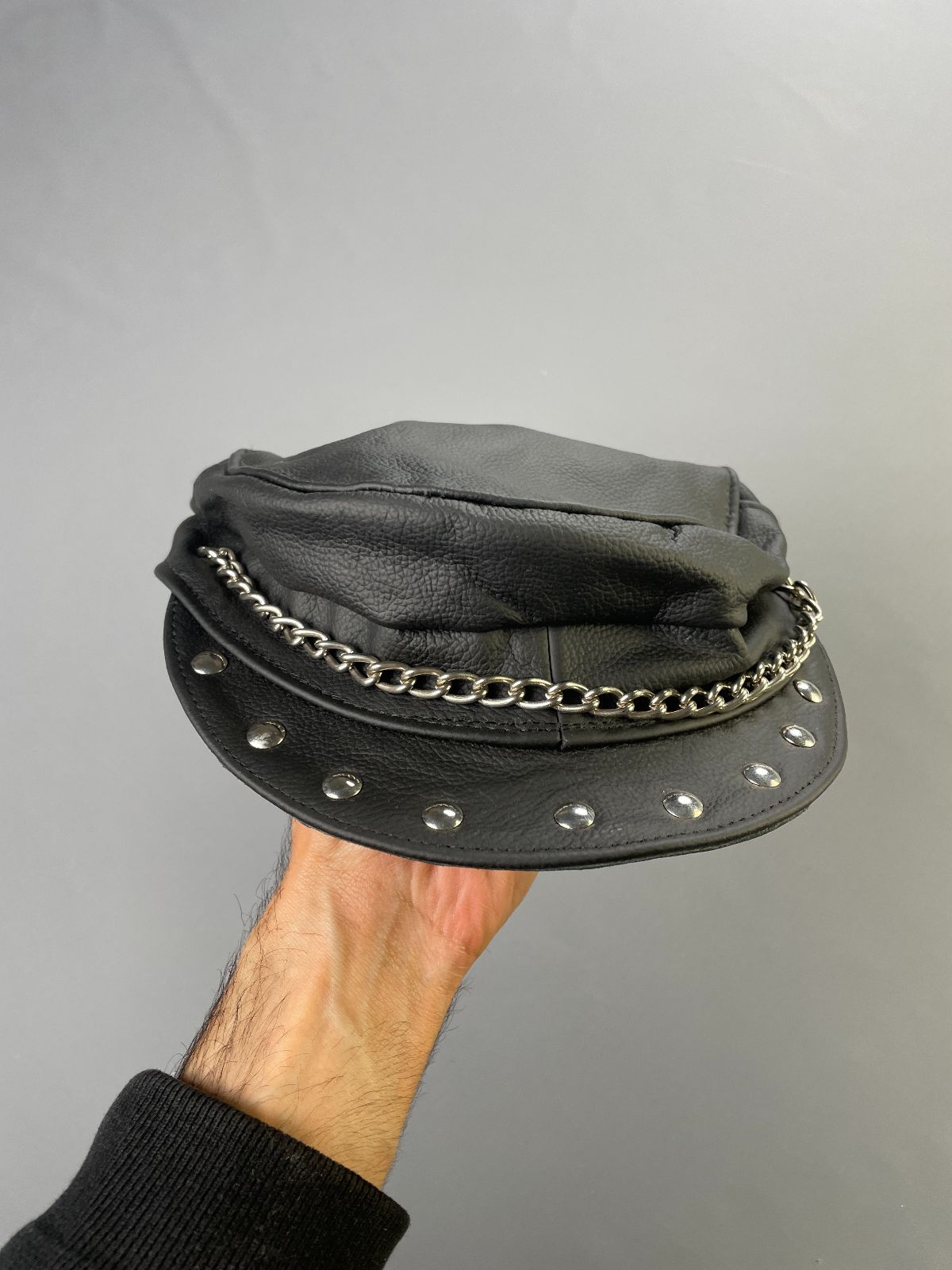 product details: LEATHER STUDDED BIKER HAT WITH CHAIN TRIM MADE IN MEXICO photo