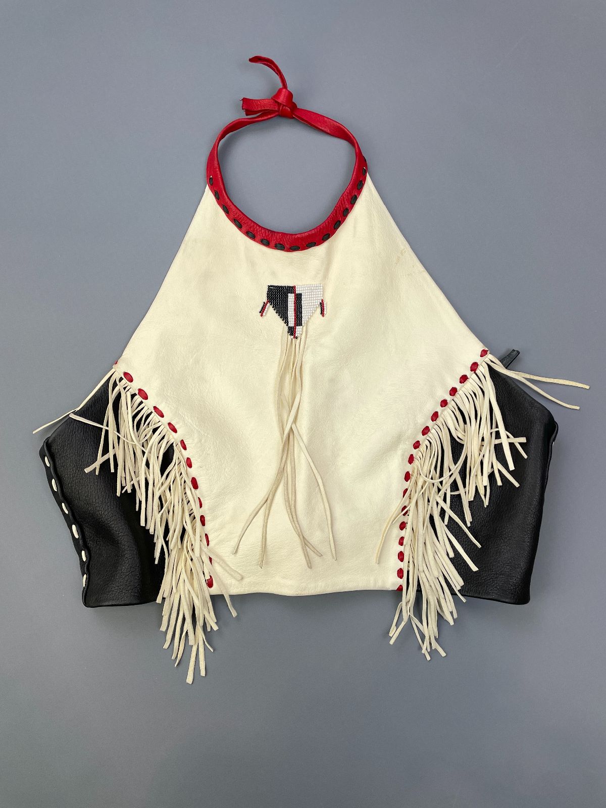 product details: *AS-IS* HANDMADE PATCHWORK LEATHER & LEATHER FRINGE TIE HALTER TOP W/ BEADED APPLIQUE photo