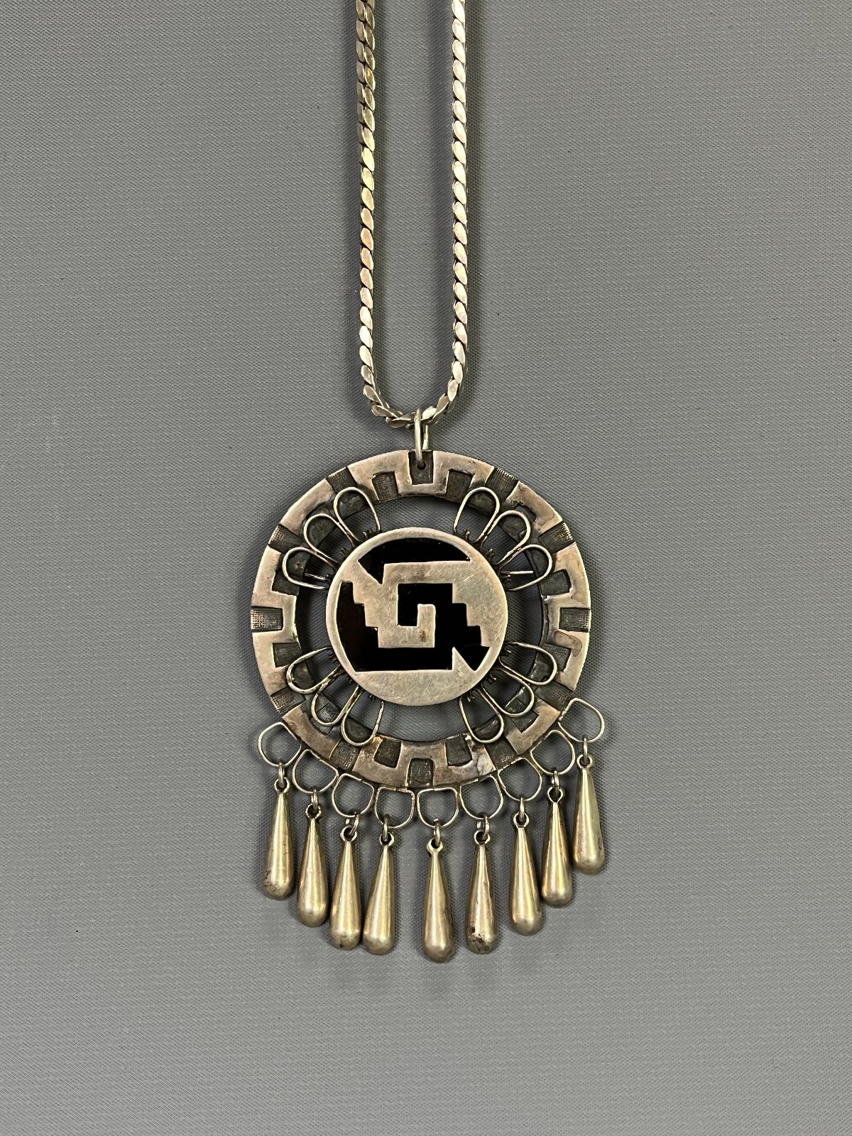 product details: 1940S *SIGNED STERLING SILVER ENAMELED AZTEC G SHIELD PENDANT NECKLACE HANGING PENDULUMS photo