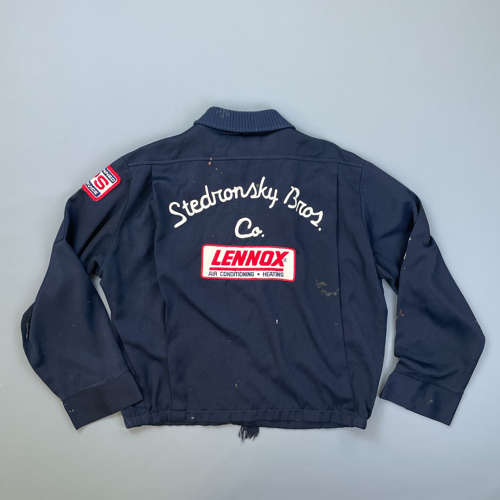 product details: *AS-IS* HEAVILY DISTRESSED LENNOX ZIPUP WORK JACKET W/ PATCHES AND CHAIN STITCH EMBROIDERY photo