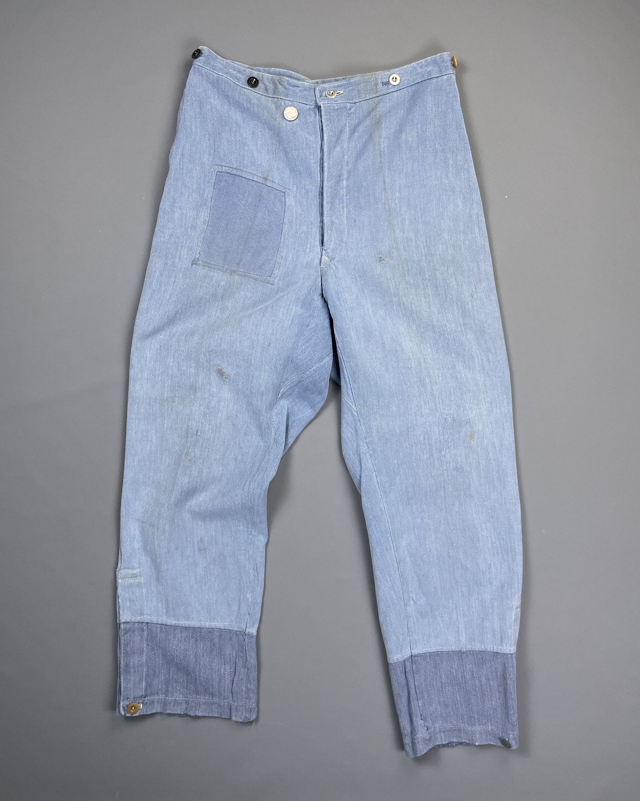 product details: *AS-IS* HERRINGBONE PATCHWORK SWISS MADE BUCKLE BACK DENIM TWILL OVERPANTS photo