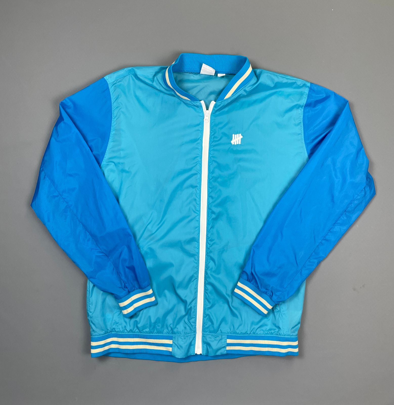product details: TWO TONE TEAL BLUE LIGHTWEIGHT BASEBALL WINDBREAKER STRIPED COLLAR & CUFFS photo
