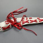 FUN! RED LEATHER CROSS WOVEN WHITE ACRYLIC FRONT TIE WAIST BELT