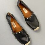 BLACK PEBBLED LEATHER ROCK STUDDED JUTE SOLE SLIP ON SHOES