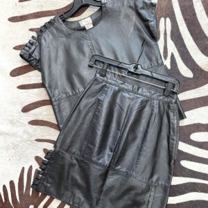 Photo detail:1980S LEATHER SET TOP & SKIRT CUT DETAIL SHOULDERS & SIDE - 2 PC SET