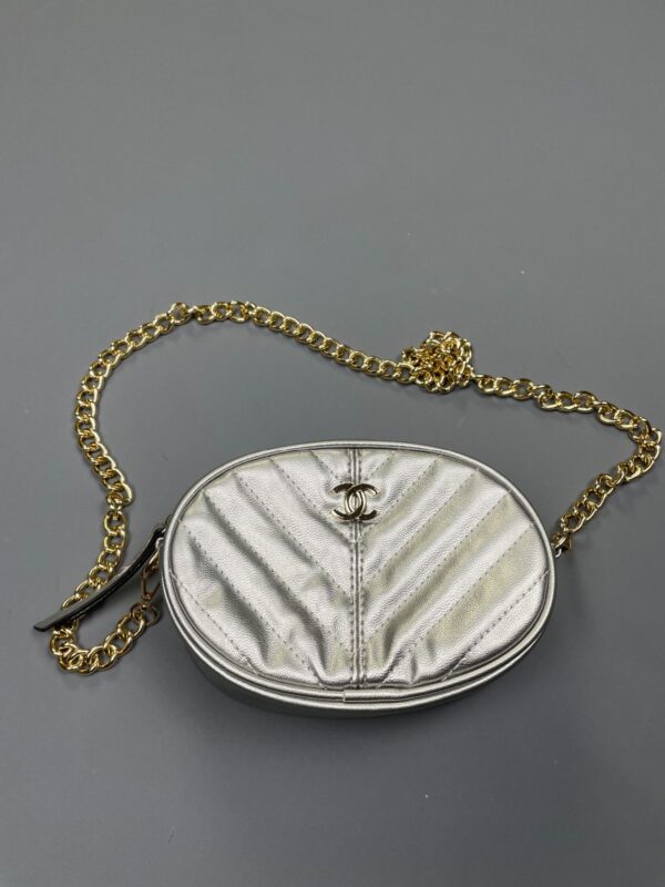 AS-IS CHANEL METALLIC SILVER OVAL CROSSBODY BAG W/ CHAIN STRAP AND BELT LOOPS