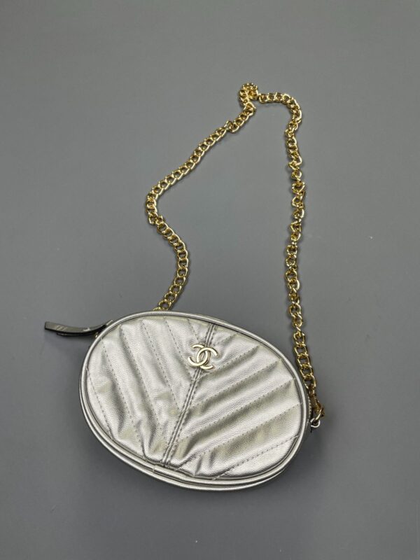 AS-IS CHANEL METALLIC SILVER OVAL CROSSBODY BAG W/ CHAIN STRAP AND BELT LOOPS