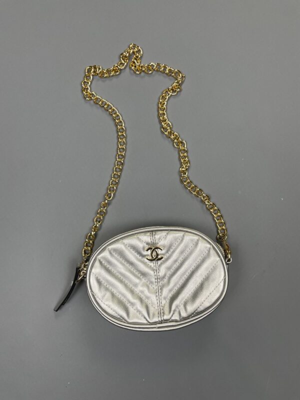 AS-IS CHANEL METALLIC SILVER OVAL CROSSBODY BAG W/ CHAIN STRAP AND BELT LOOPS