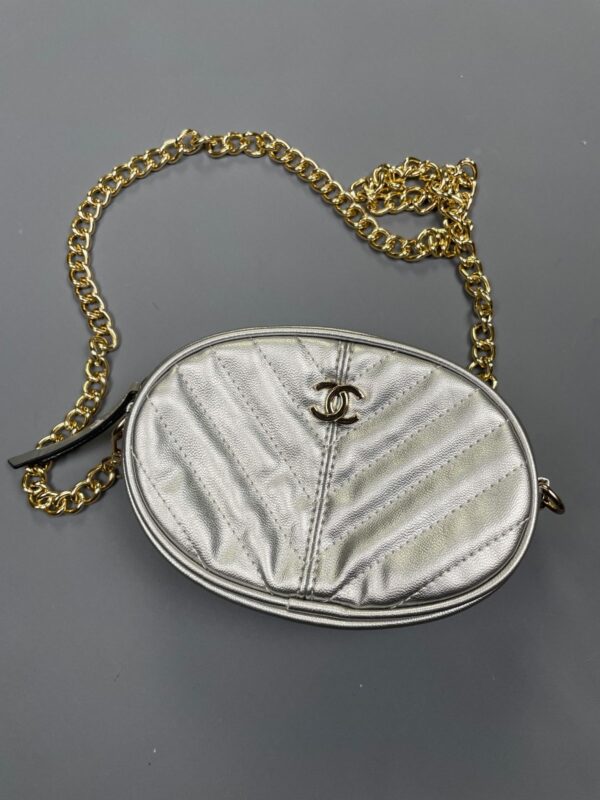 AS-IS CHANEL METALLIC SILVER OVAL CROSSBODY BAG W/ CHAIN STRAP AND BELT LOOPS