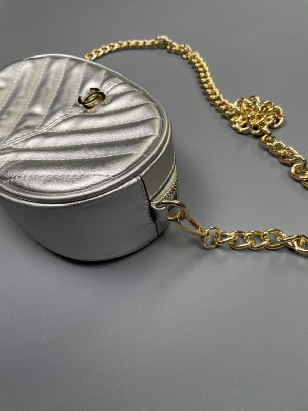 AS-IS CHANEL METALLIC SILVER OVAL CROSSBODY BAG W/ CHAIN STRAP AND BELT LOOPS