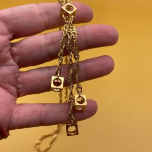 Photo detail:TWISTED GOLD CHAIN FUNKY CUBE PENDANTS 1980S DEADSTOCK