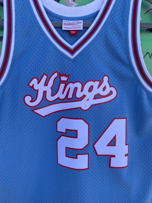 SACREMENTO KINGS REGGIE THEUS 24 BASKETBALL HERITAGE JERSEY