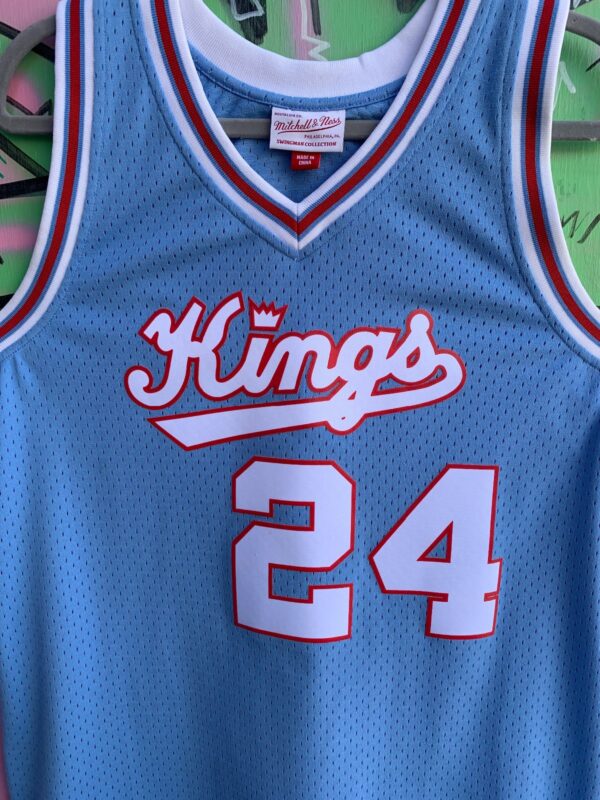 SACREMENTO KINGS REGGIE THEUS 24 BASKETBALL HERITAGE JERSEY