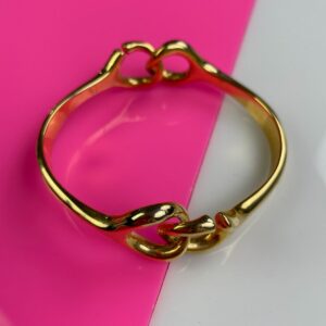 Photo detail:HIGH POLISHED INTERLOCKING CURVED GOLD BRACELET