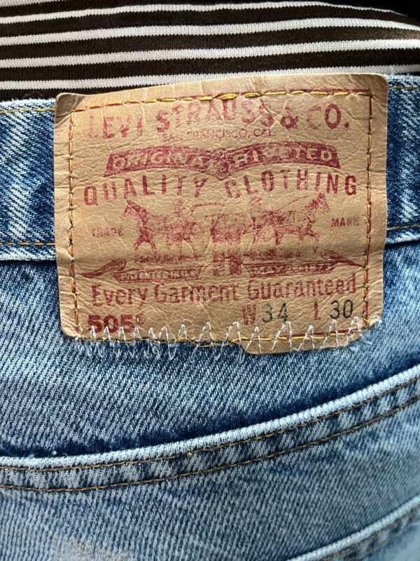 PERFECTLY WORN MENDED LEVIS 505 STRAIGHT LEG FADED BLUE DENIM JEANS