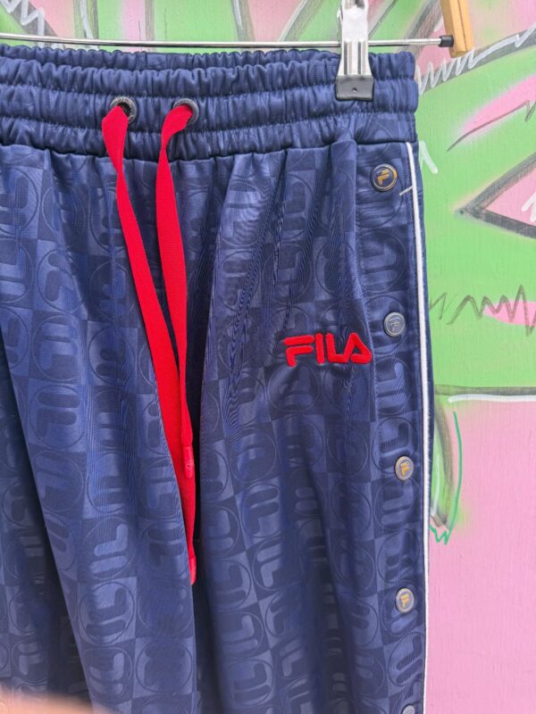 SUBTLE MONOGRAM PRINT FILA FULL SIDE SNAP TRACK PANTS
