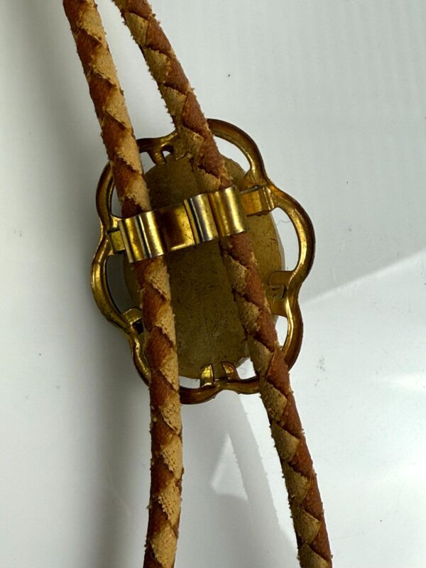 GOLD FRAMED CABOCHON BOLO TIE, CARVED BONE TIPS, 2-TONE BRAIDED LEATHER CORD