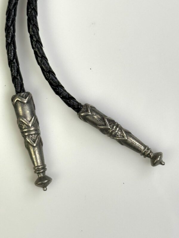ETCHED PEWTER FLYING EAGLE DESIGN BOLO TIE, BRAIDED LEATHER CORD, SIGNED 89