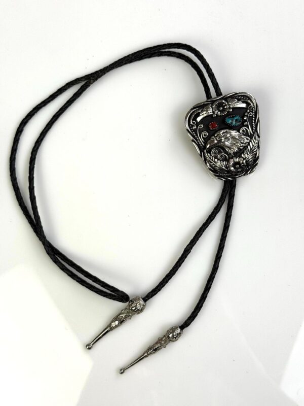 HEAVY ORNATE EAGLE HEAD BOLO TIE, TURQUOISE & CORAL STONES, BRAIDED LEATHER CORD