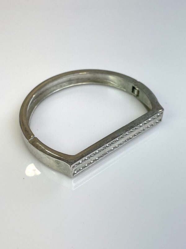 POLISHED CHROME HINGED BRACELET DOUBLE ROW RHINESTONE DETAIL