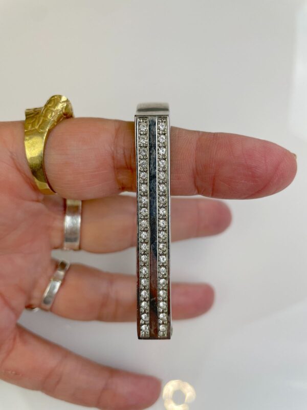 POLISHED CHROME HINGED BRACELET DOUBLE ROW RHINESTONE DETAIL