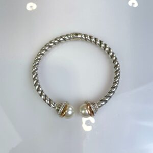 Photo detail:HINGED TWISTED SILVER BRACELET PEARL & RHINESTONE ADORNMENTS