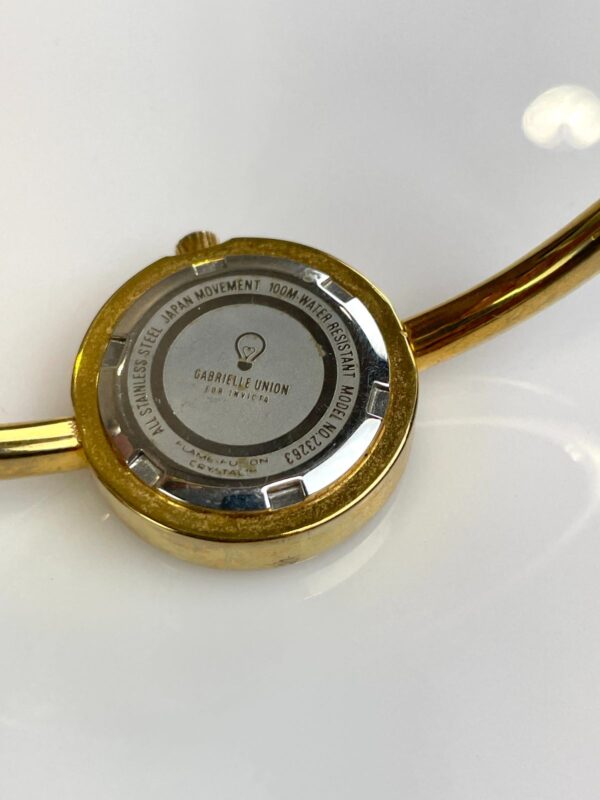 HIGH POLISHED GOLD HINGED BRACELET TIMEPIECE WATCH, CRYSTAL EMBELLISHED MOTHER OF PEARL FACE