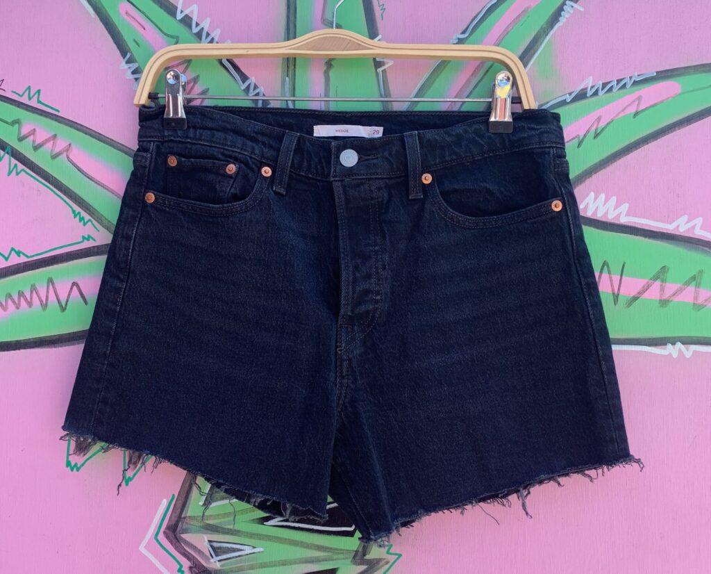 BLACK DENIM "WEDGIE" FIT CUT OFF SHORTS