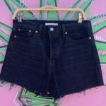 BLACK DENIM “WEDGIE” FIT CUT OFF SHORTS