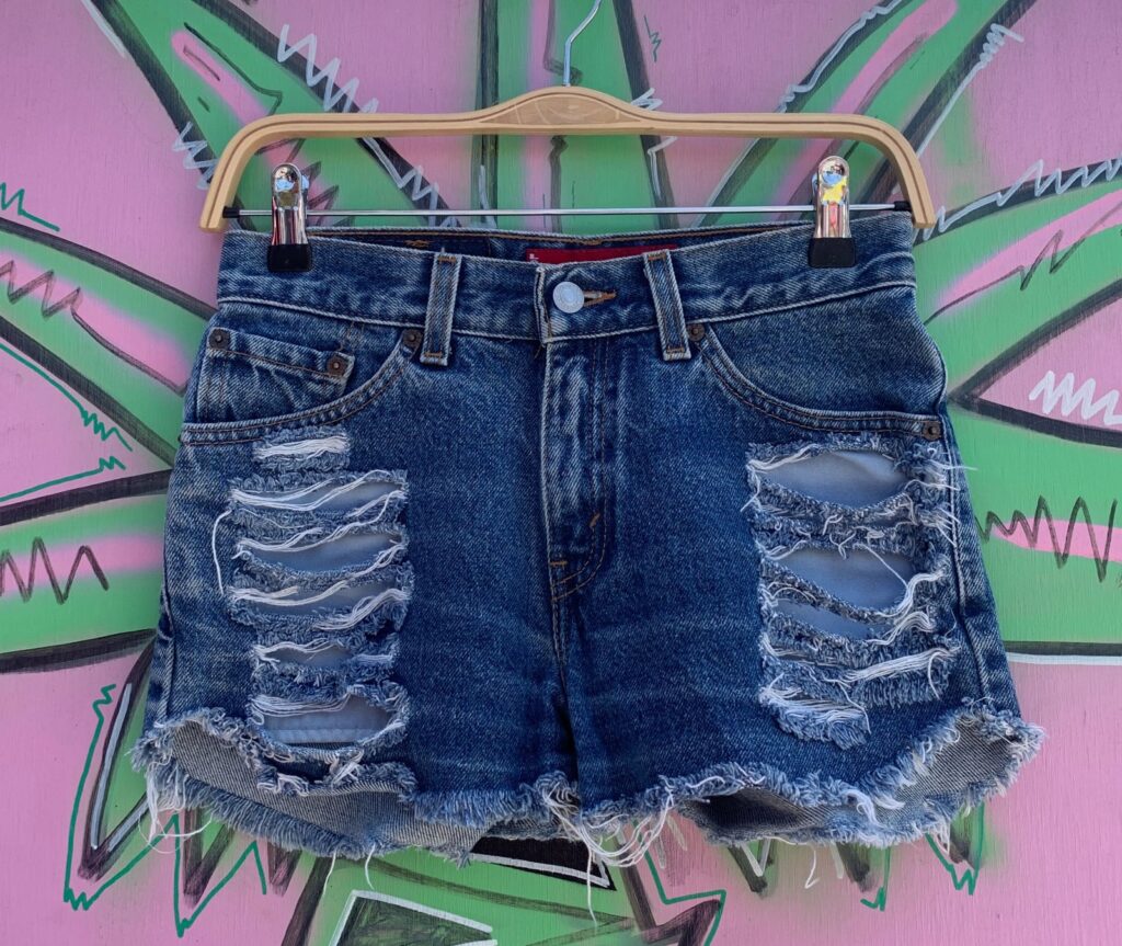 1990S STONEWASH LEVIS 517 DENIM CUTOFF SHORTS FRONT RIPS