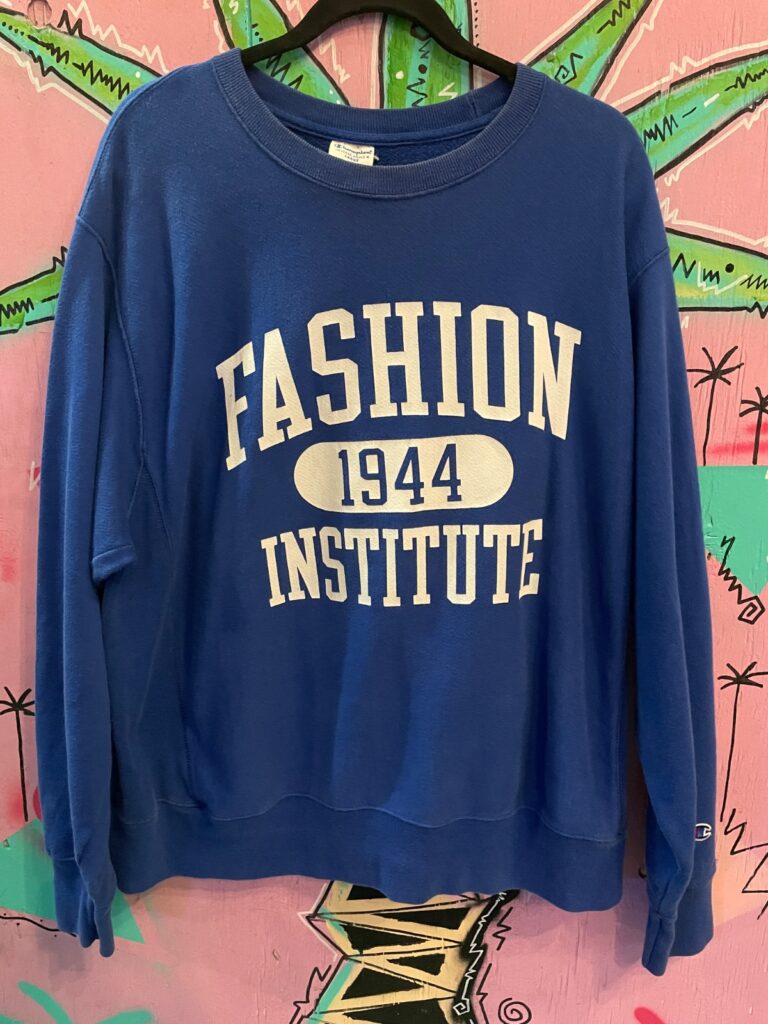 REVERSE WEAVE FASHION INSTITUTE 1944 GRAPHIC CREWNECK SWEATSHIRT