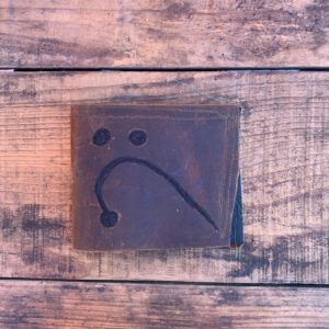Photo detail:MUSICAL NOTE HAND MADE LEATHER WALLET