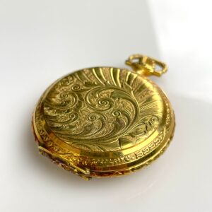Photo detail:ORNATE GOLD PLATED WIND-UP POCKET WATCH 17 JEWELS INCABLOC SWISS MOVEMENT