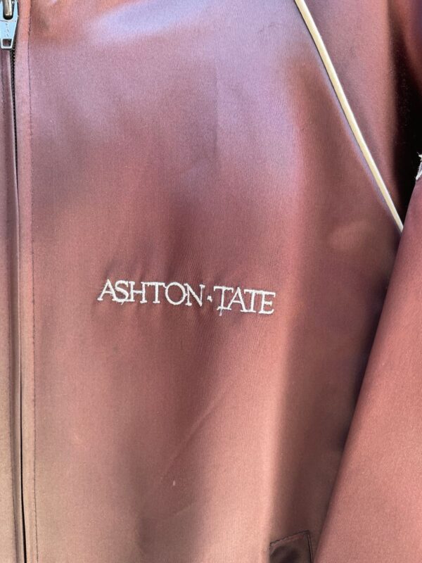 1980S EMBROIDERED ASHTON-TATE SOFTWARE COMPANY ACETATE ZIP-UP JACKET, SILVER PIPING