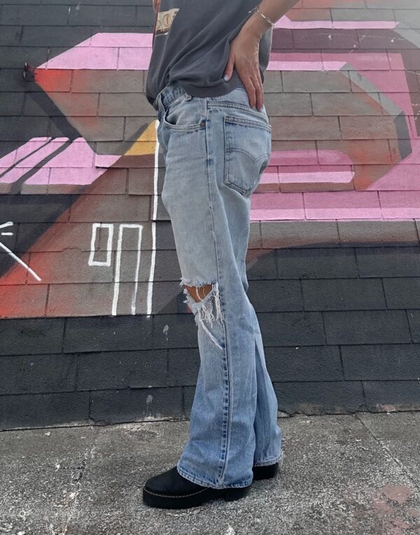 LIGHT WASH & DISTRESSED ORANGE TAB ZIP FLY DENIM JEANS