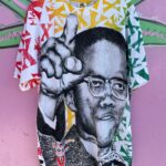 *AS-IS* 1990S DEADSTOCK AOP ALL OVER PRINT MALCOM X T-SHIRT RASTA COLORS