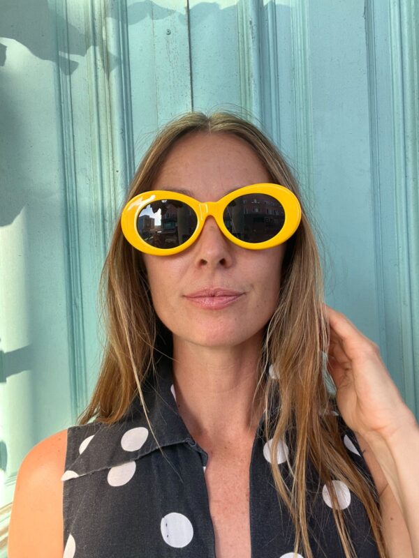 OVAL YELLOW SUNGLASSES BLACK LENSES