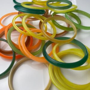 Photo detail:RETRO 1960S STACKABLE COLORFUL MOONGLOW ACRYLIC BANGLES - GROUP 1