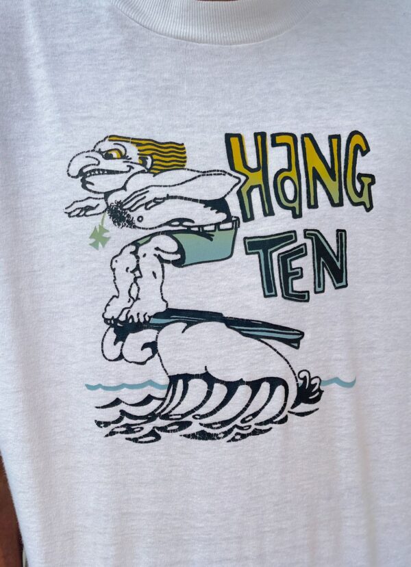 HANG TEN SURFING DUDE WITH NECKLACE GRAPHIC T SHIRT