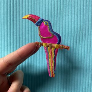 Photo detail:EMBROIDERED SATIN TOUCAN PATCH PINK *OLD STOCK