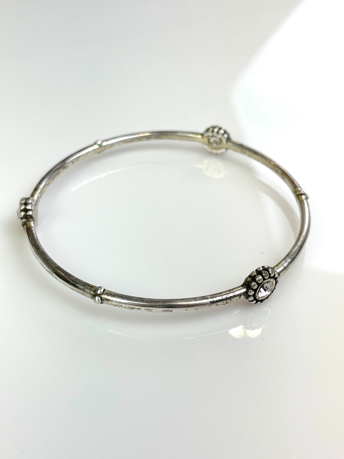product details: THIN STERLING SILVER BANGLE BRACELET, TOPAZ STONES photo