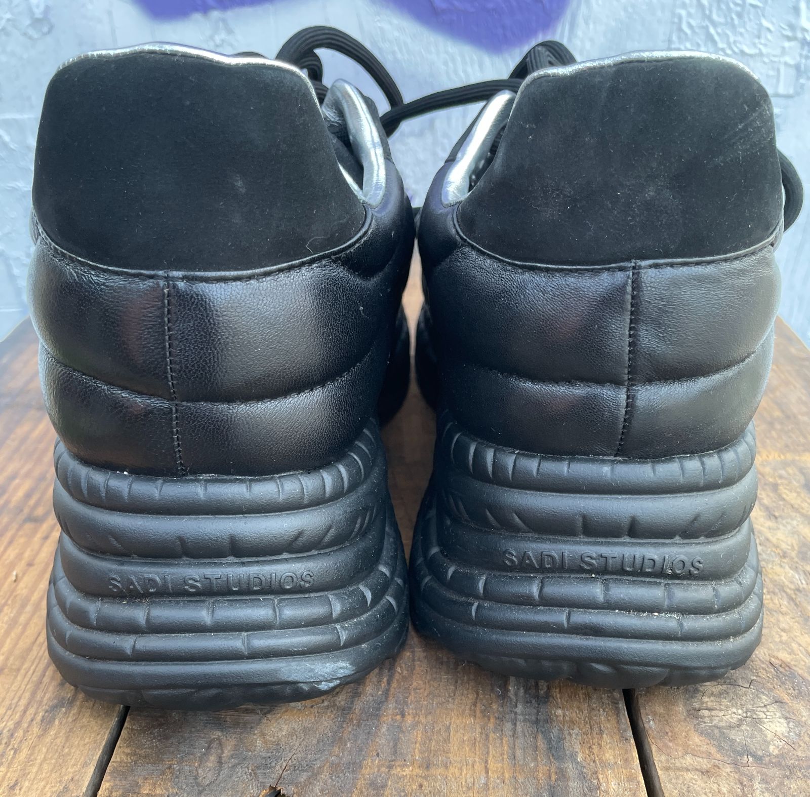 product details: POP BLACK LEATHER CHUNKY PLATFORM SNEAKERS photo