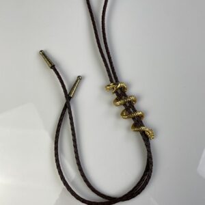 Photo detail:GOLD PLATED COILED SNAKE BOLO TIE