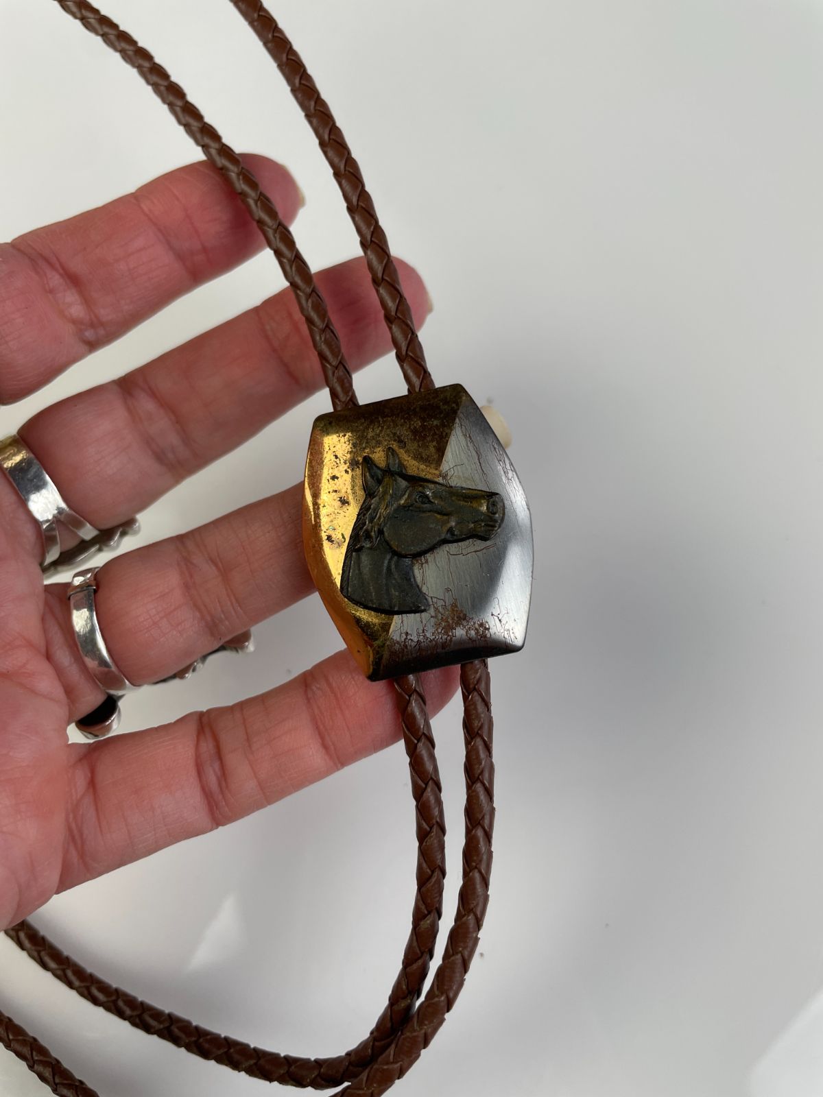 2-TONE PLAQUE HORSE PROFILE BOLO TIE, BRAIDED LEATHER CORD in BROWN, GOLD