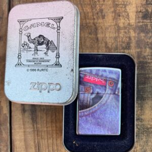 ZIPPO DEADSTOCK ZIPPO LIGHTER W/ ZIPPO JEAN POCKET PICTURE W/ CAMEL METAL TIN