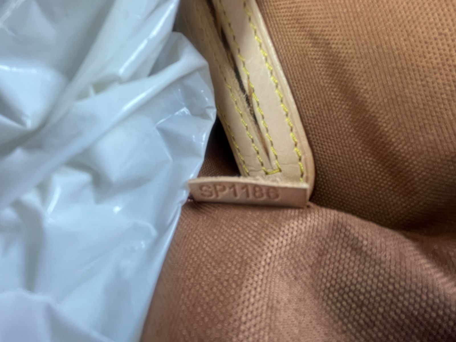 LOUIS VUITTON RETRO 1990S LOUIS VUITTON MONOGRAM MINI BACKPACK, LEATHER TRIM in BROWN, YELLOW