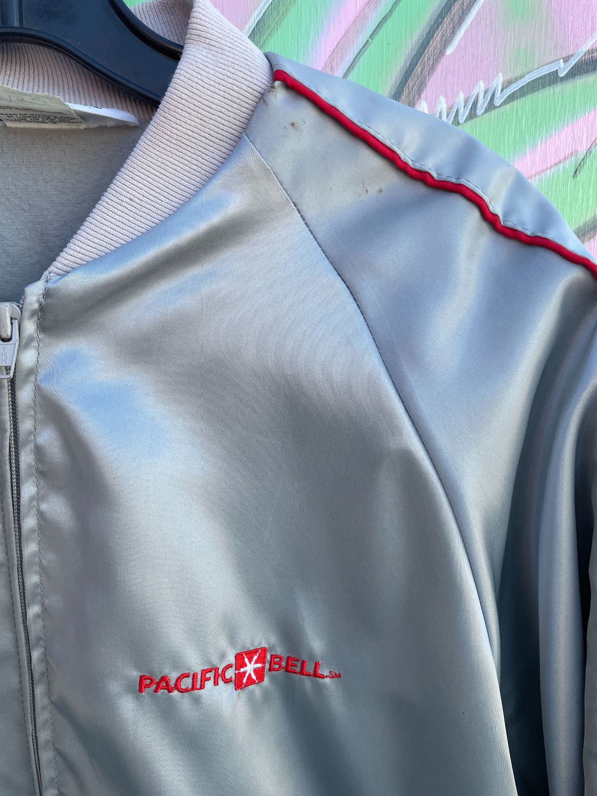 HORIZON EMBROIDERED PACIFIC BELL SILVER ZIPUP JACKET W/ RED PIPING in SILVER, RED